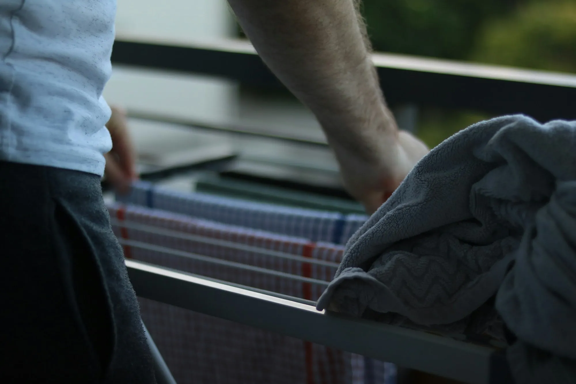 Laundry being hung on a drying rack