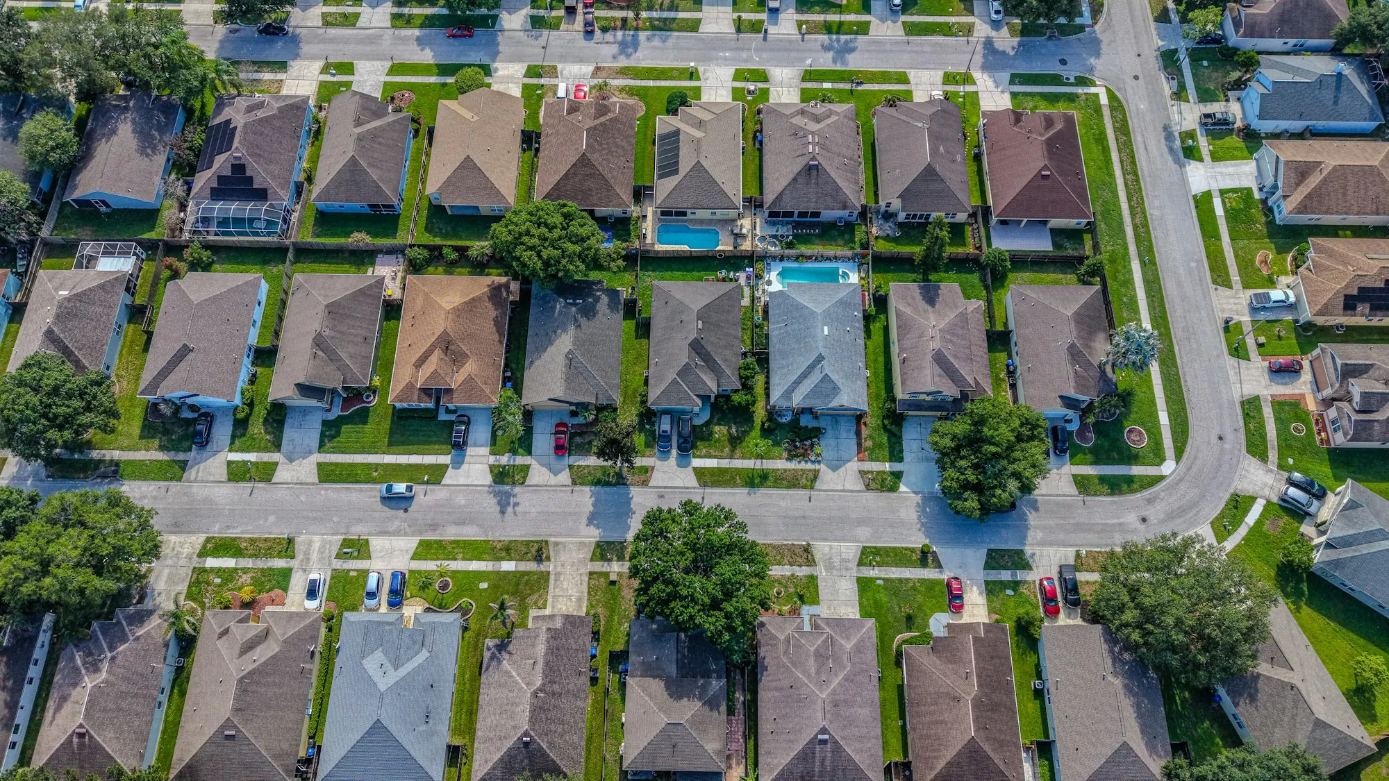 A residential neighbourhood of houses and gardens